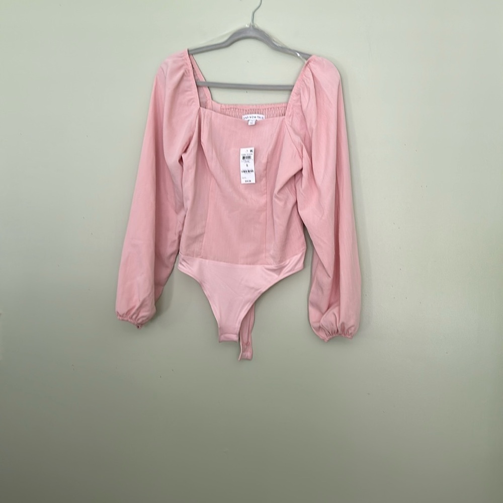 AND NOW THIS bodysuit in lotus pink